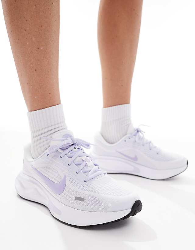 asos Nike Running Journey Run trainers in white and lilac