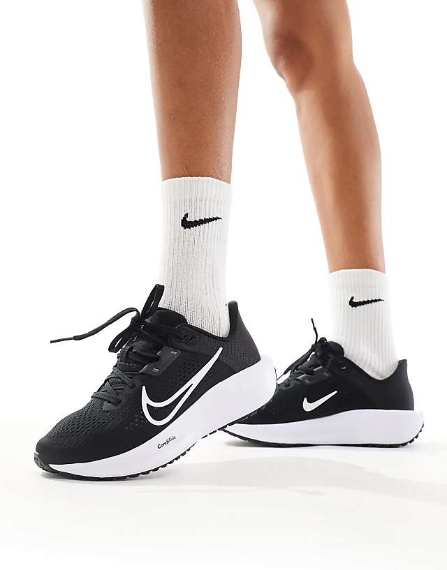 asos Nike Running Quest 6 trainers in black and white