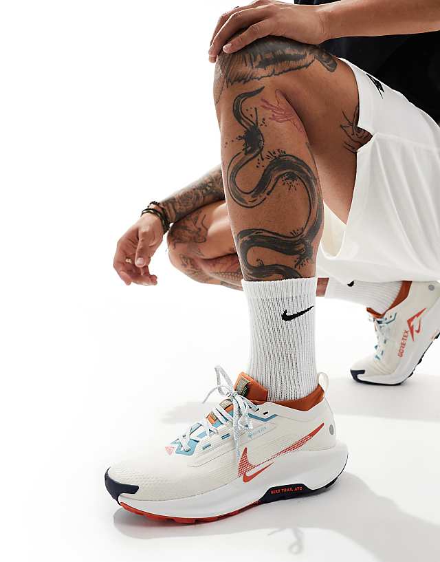 asos Nike Running ReactX Pegasus Trail 5 GORE-TEX trainers in white and red