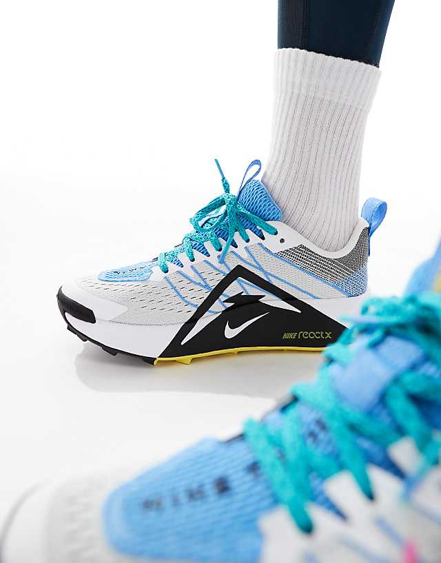 Asos Nike Running ReactX Wildhorse Trainers In White And Blue