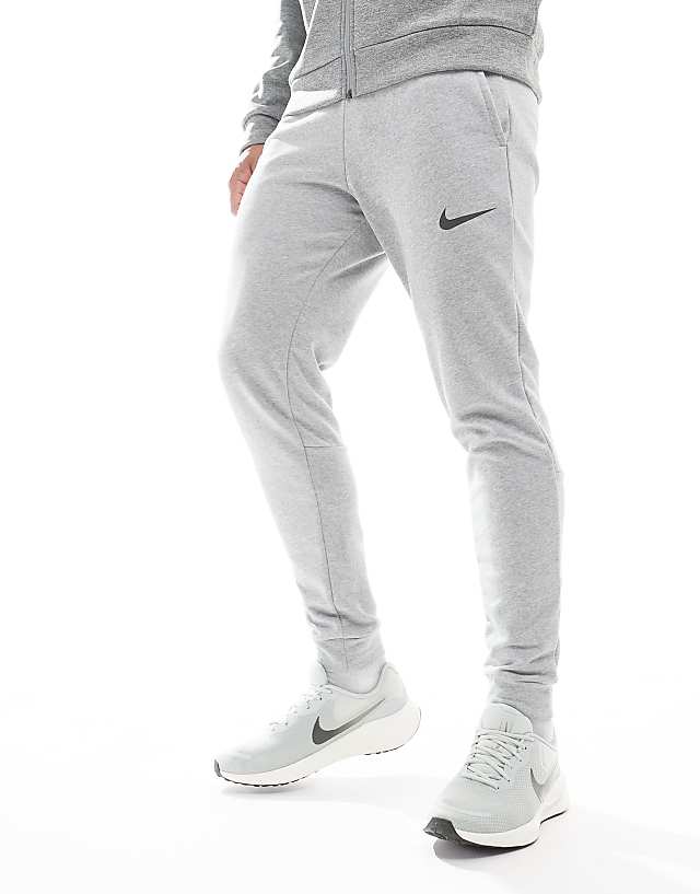 Asos Nike Running Revolution 7 Trainers In Light Silver