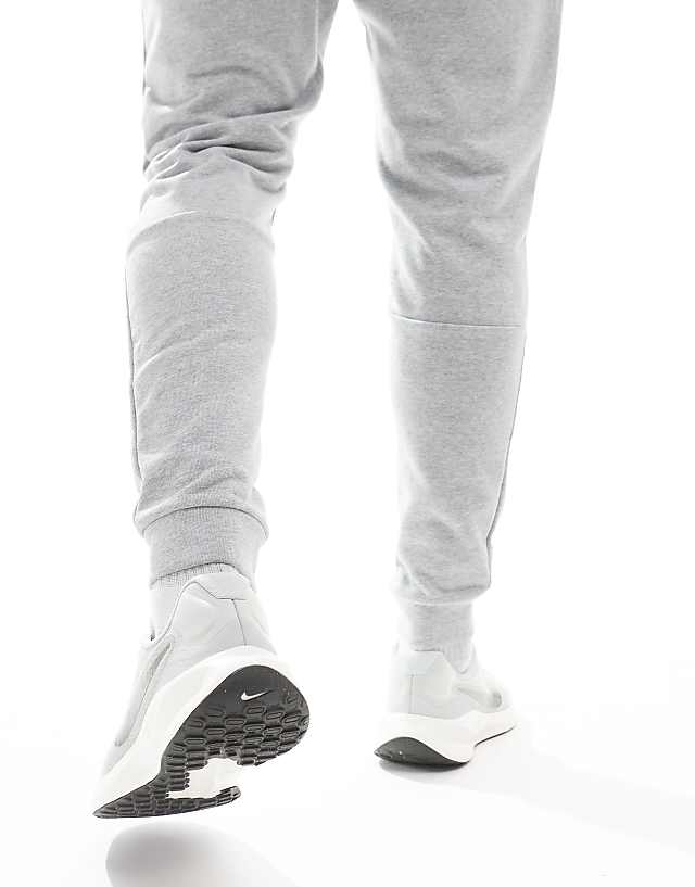 Asos Nike Running Revolution 7 Trainers In Light Silver