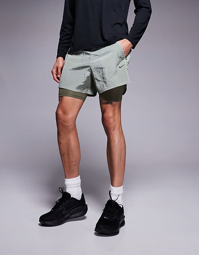 asos Nike Running Run Division Stride 5 inch 2 in 1 shorts in light green