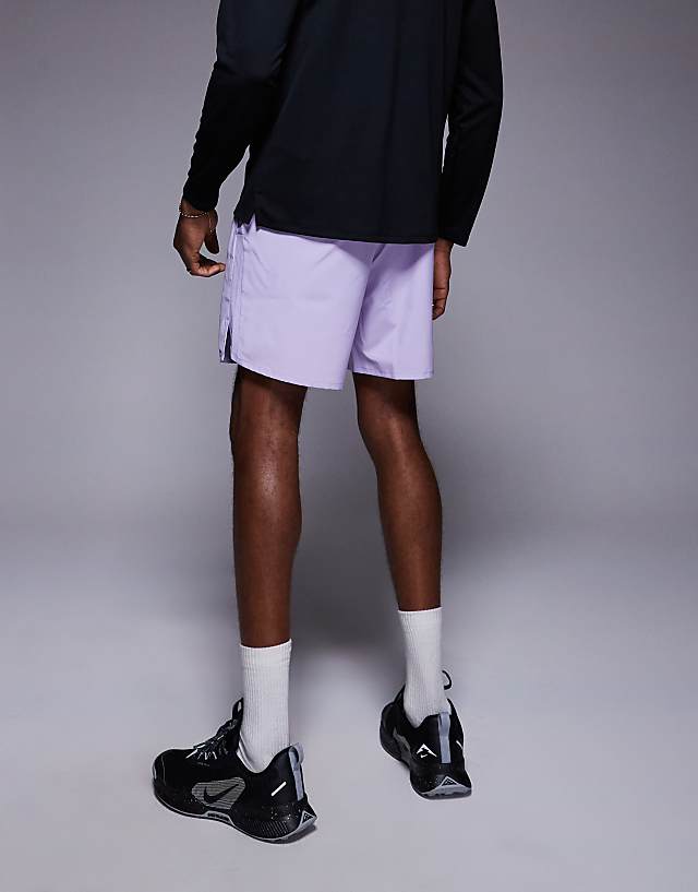 Asos Nike Running Run Energy Challenger 7 Inch Shorts In Purple