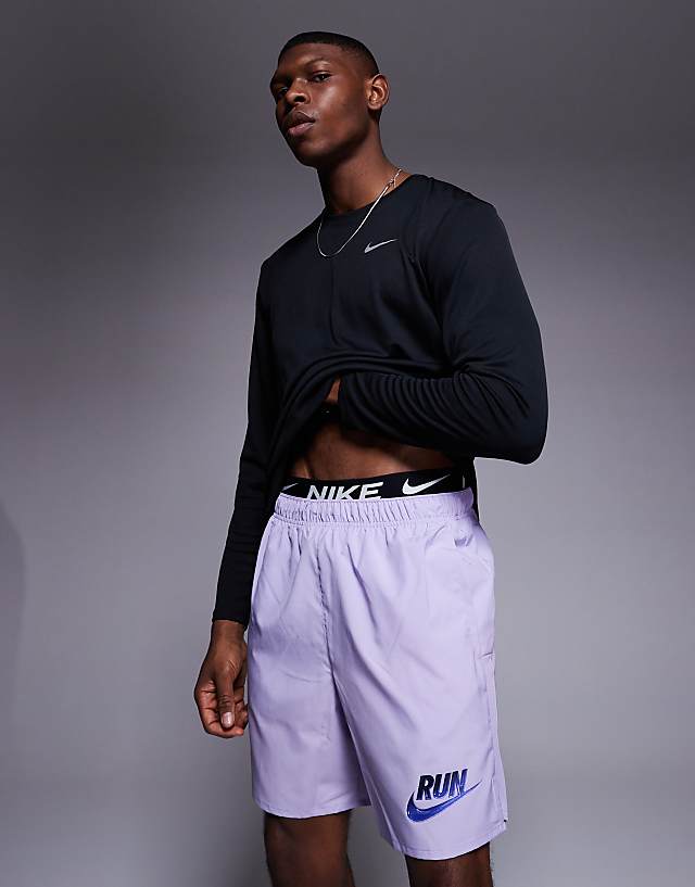 Asos Nike Running Run Energy Challenger 7 Inch Shorts In Purple