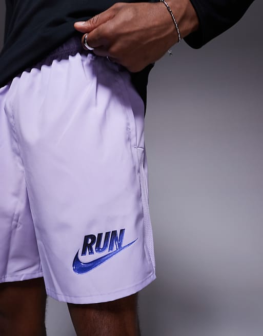 Asos Nike Running Run Energy Challenger 7 Inch Shorts In Purple