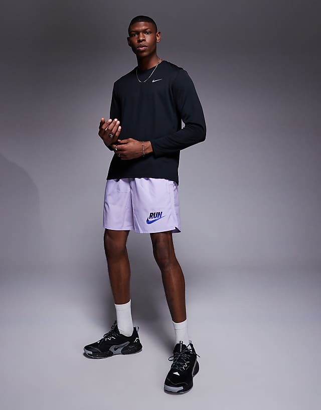 asos Nike Running Run Energy Challenger 7 inch shorts in purple