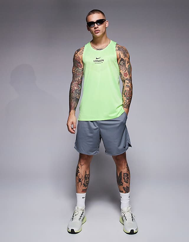 Asos Nike Running Stride City Marathon Vest In Green