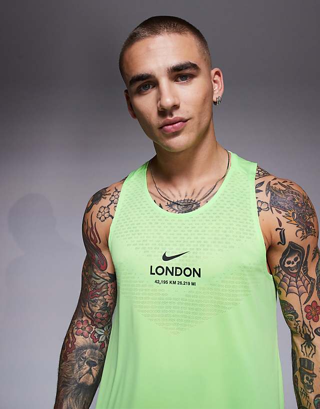 Asos Nike Running Stride City Marathon Vest In Green