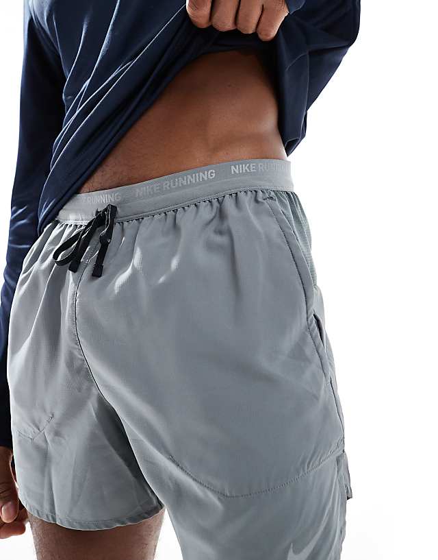 Asos Nike Running Stride Dri-FIT 5 Inch Shorts In Grey