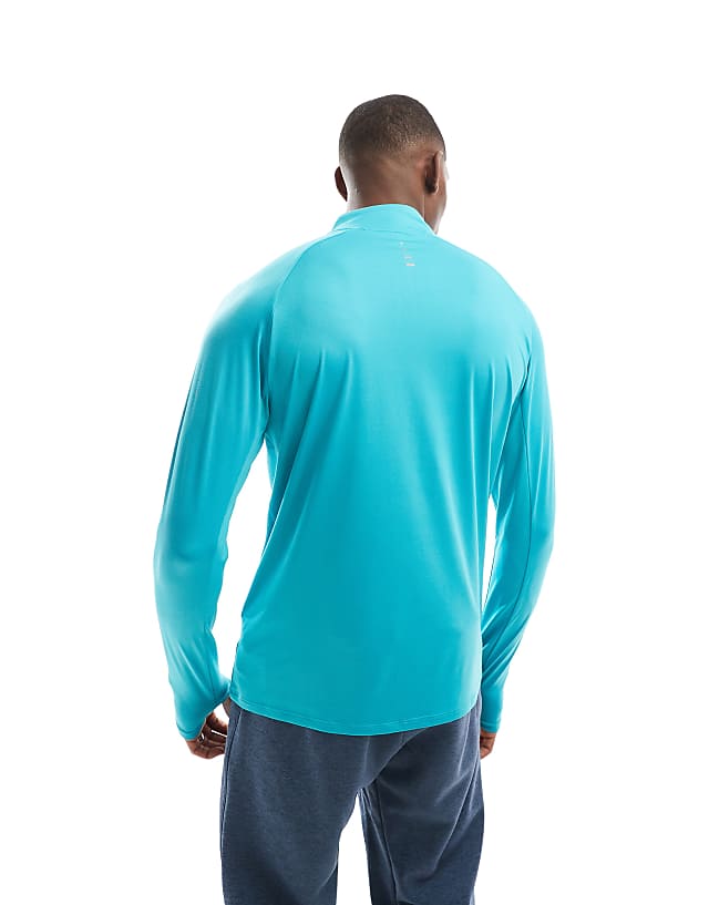 Asos Nike Running Stride Dri-FIT Half Zip Longsleeve Top In Turquoise