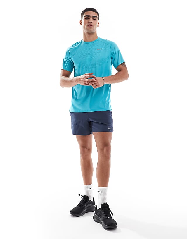 Asos Nike Running Stride Dri-FIT T-shirt In Turquoise