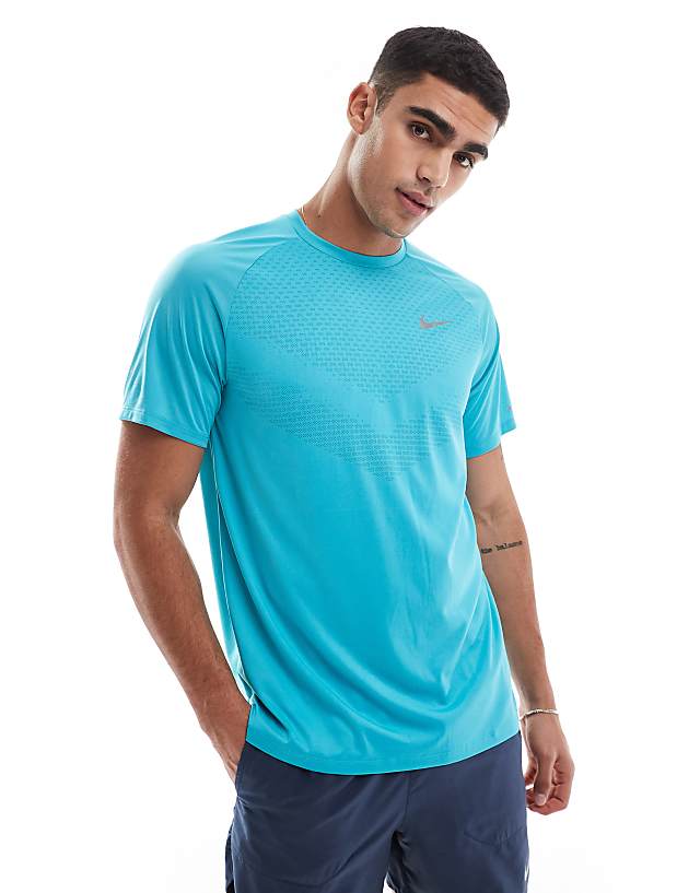 asos Nike Running Stride Dri-FIT t-shirt in turquoise