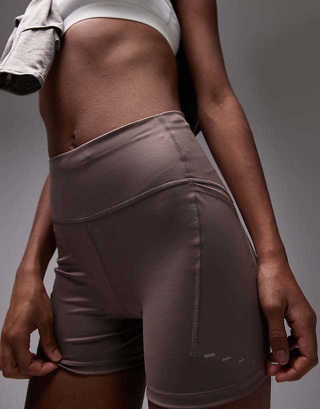 Asos Nike Running Swift Dri-FIT High Waisted 4 Inch Legging Shorts In Brown