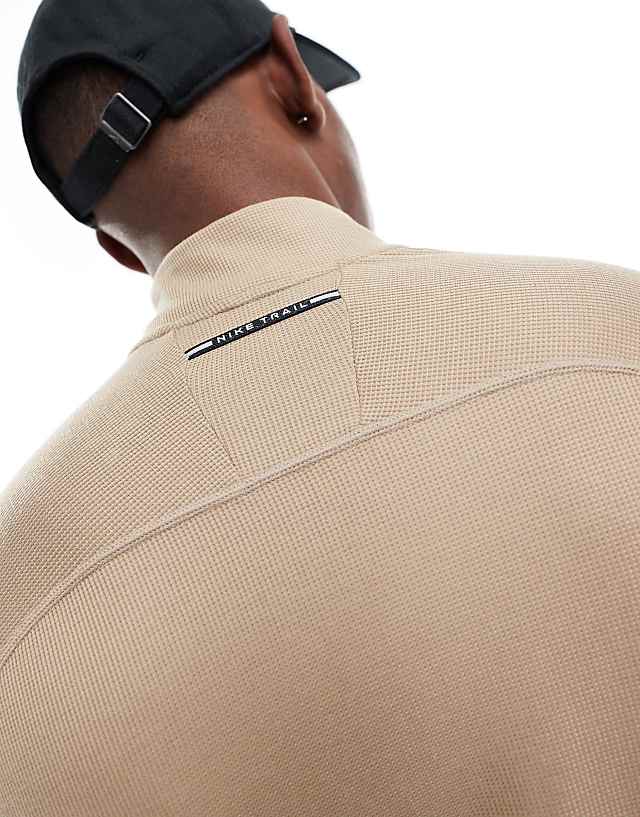 Asos Nike Running Trail 1/4 Zip Sweatshirt In Beige