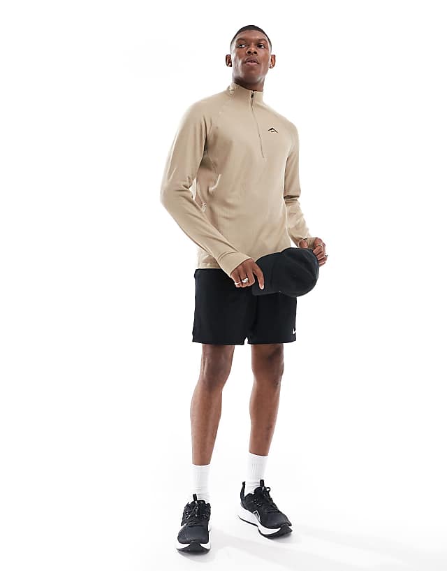 Asos Nike Running Trail 1/4 Zip Sweatshirt In Beige