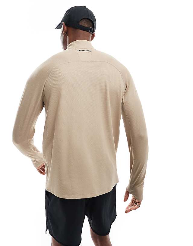 Asos Nike Running Trail 1/4 Zip Sweatshirt In Beige