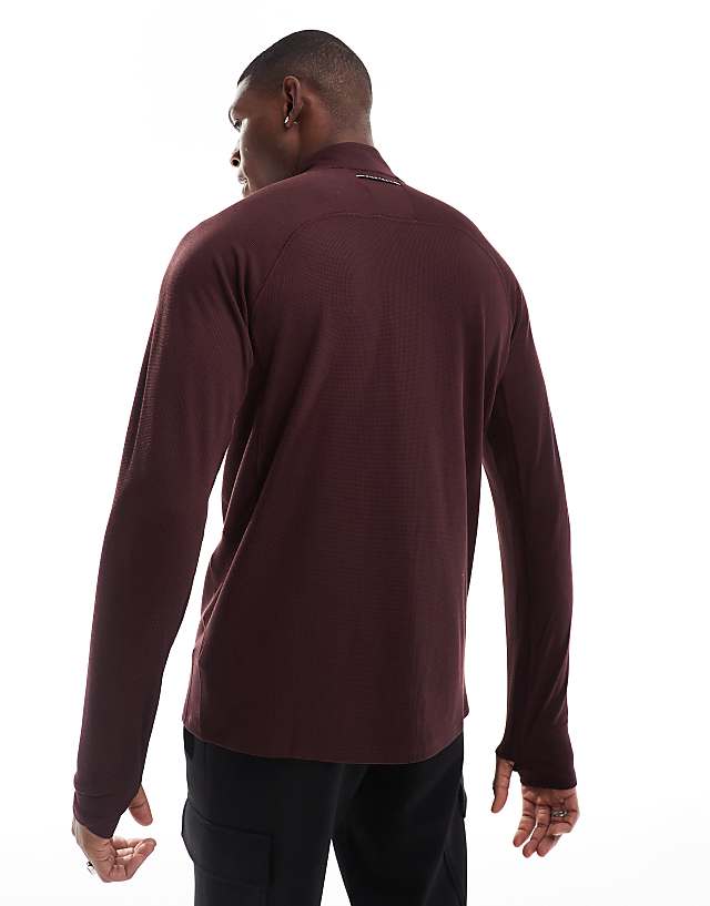 Asos Nike Running Trail 1/4 Zip Sweatshirt In Burgundy