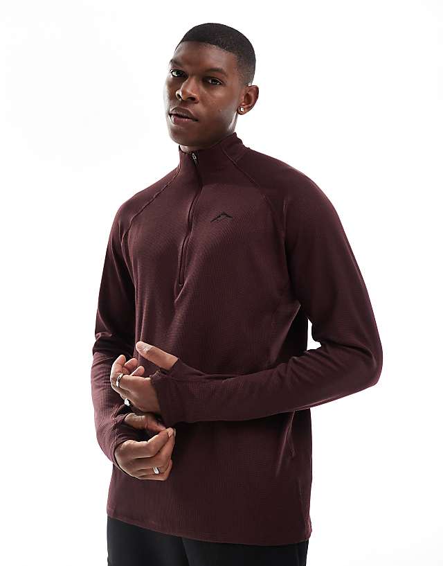 asos Nike Running Trail 1/4 zip sweatshirt in burgundy