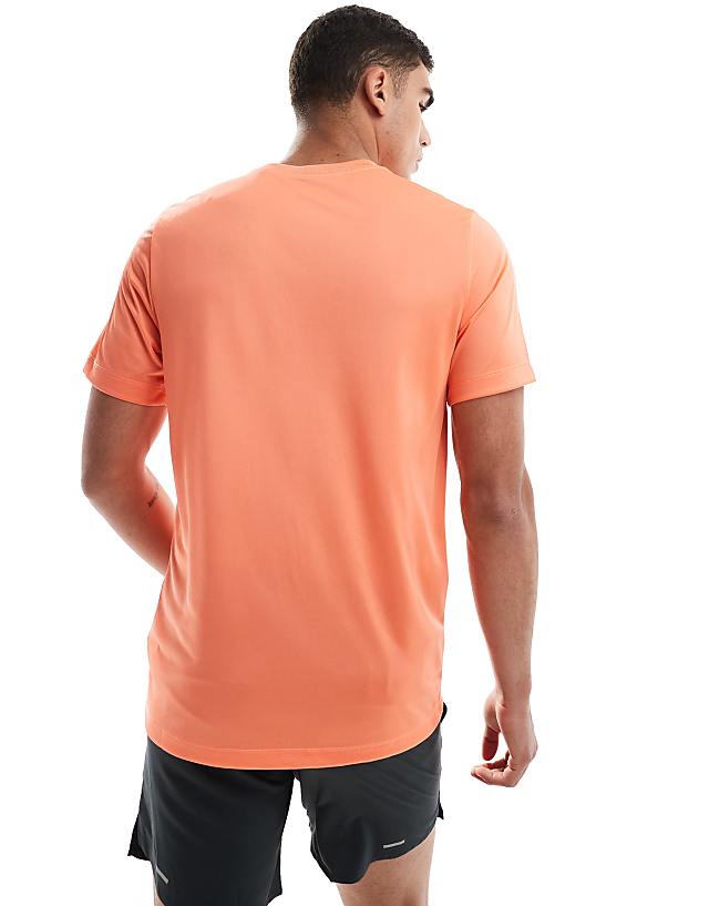 Asos Nike Training Dri-FIT Graphic T-shirt In Orange