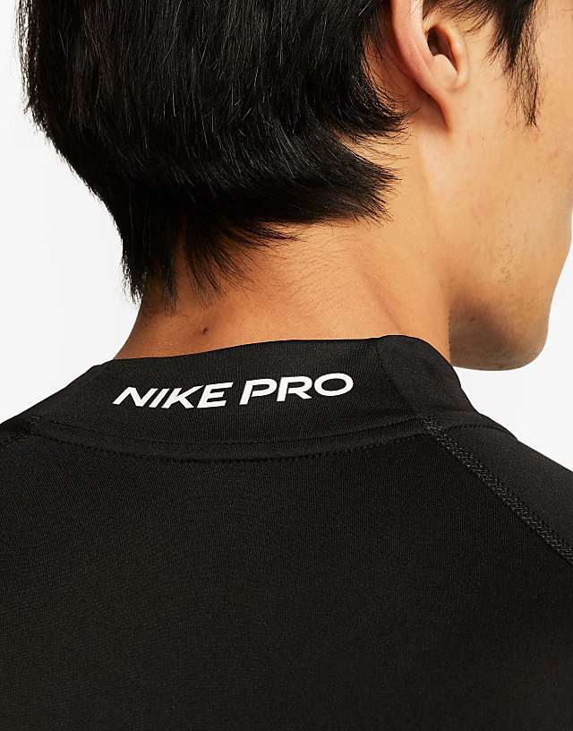 Asos Nike Training Dri-FIT Long Sleeve Top In Black