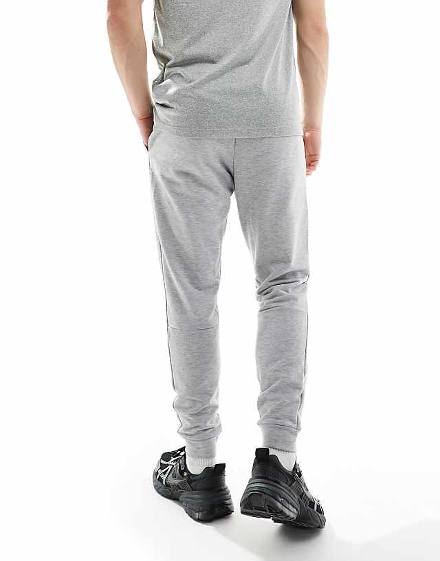 Asos Nike Training Dri-FIT Tapered Fleece Joggers In Grey