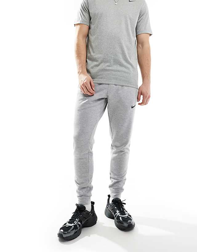 Asos Nike Training Dri-FIT Tapered Fleece Joggers In Grey