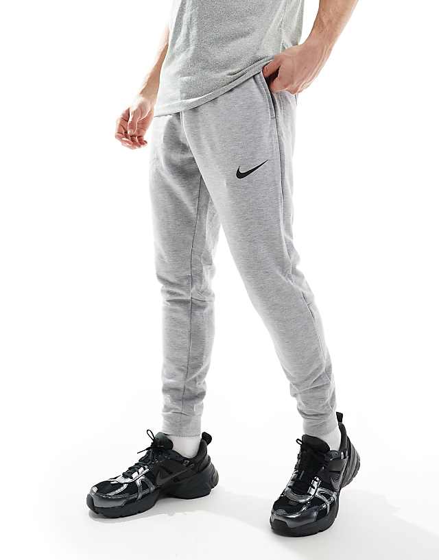 asos Nike Training Dri-FIT tapered fleece joggers in grey
