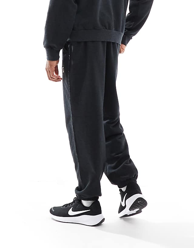 Asos Nike Training Heritage Fleece Joggers In Black
