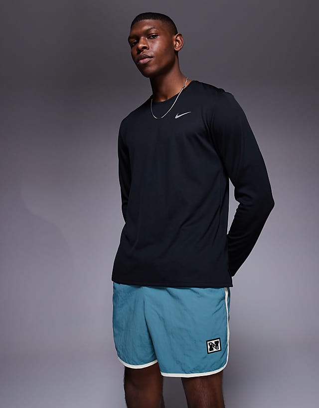 asos Nike Training Heritage woven 5 inch shorts in blue
