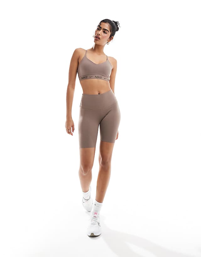 Asos Nike Training Indy Dri-FIT Light Support Sports Bra In Brown