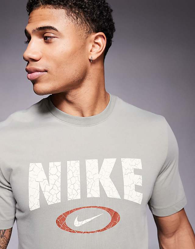 Asos Nike Training Oval Swoosh Graphic T-shirt In Light Green