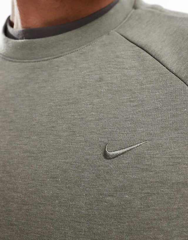 Asos Nike Training Primary Dri-FIT Sweatshirt In Light Khaki