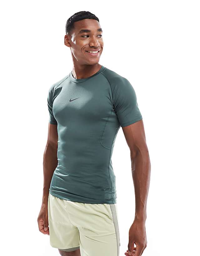 asos Nike Training Pro tight short sleeve top in green