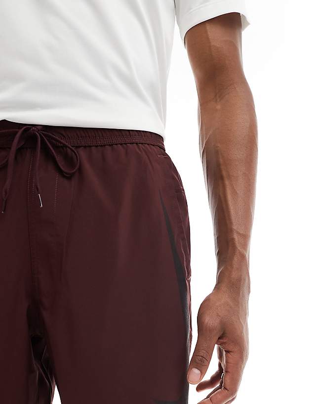 Asos Nike Training Swoosh Graphic 7 Inch Shorts In Burgundy