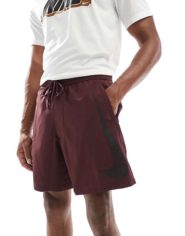 asos Nike Training Swoosh graphic 7 inch shorts in burgundy