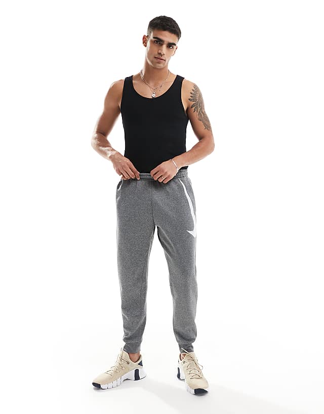 Asos Nike Training Swoosh Graphic Tapered Joggers In Grey
