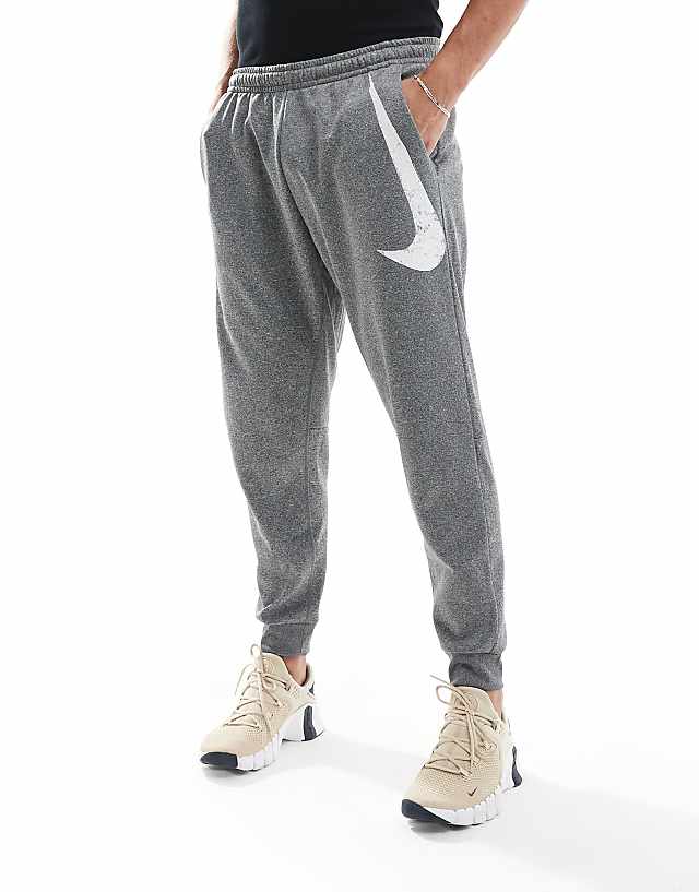 asos Nike Training Swoosh graphic tapered joggers in grey