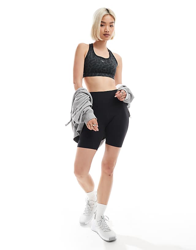 Asos Nike Training Swoosh Leopard Print Medium Support Sports Bra In Black