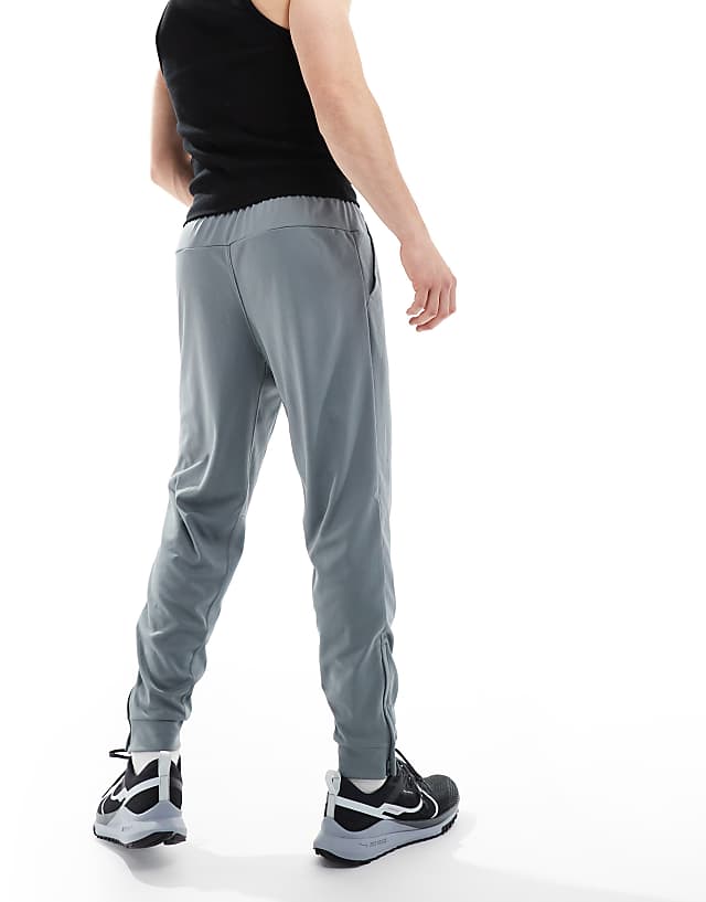 Asos Nike Training Totality Dri-FIT Tapered Joggers In Grey