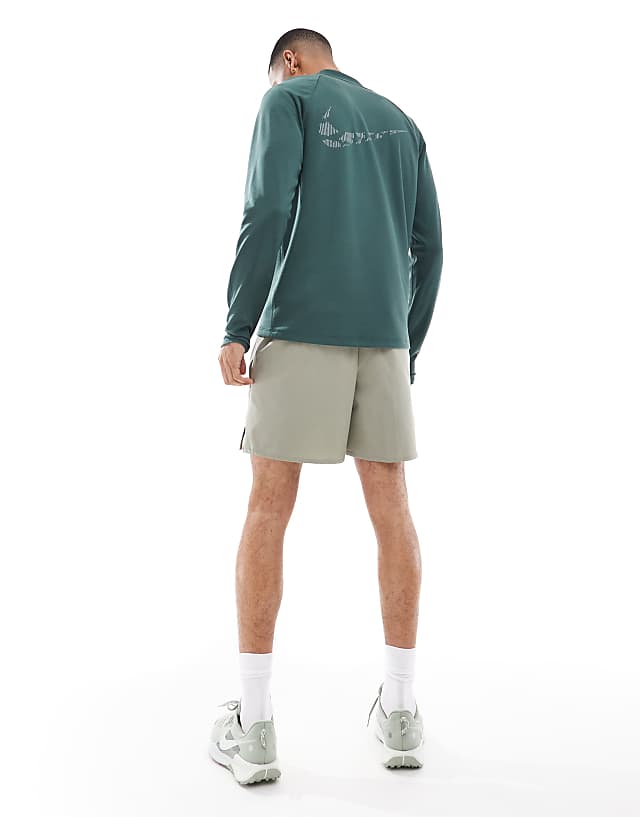 Asos Nike Training Unlimited Dri-FIT Woven 7 Inch Shorts In Light Green