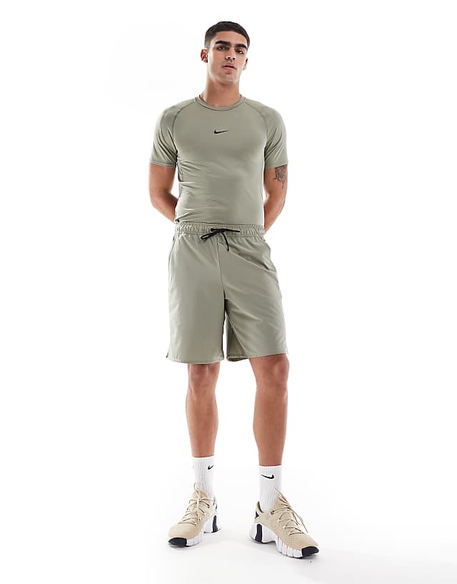 Asos Nike Training Unlimited Dri-FIT Woven 9inch Shorts In Light Green