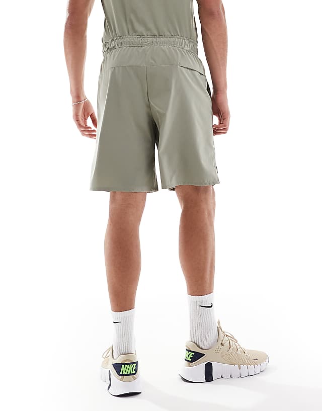 Asos Nike Training Unlimited Dri-FIT Woven 9inch Shorts In Light Green