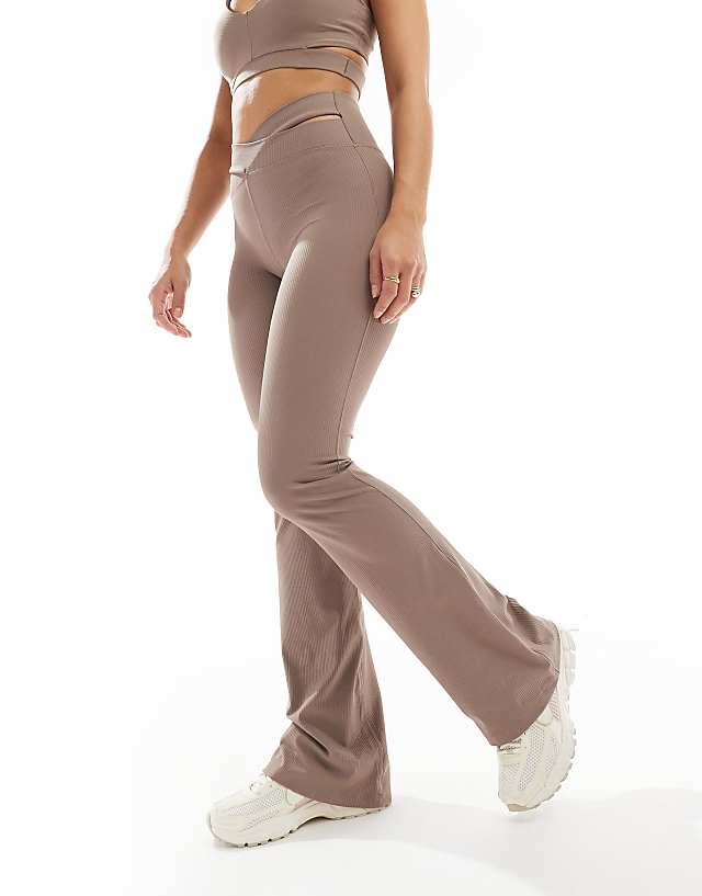 Asos Nike Training Zenvy Dri-FIT Ribbed Cut Out High Waisted Flares In Brown
