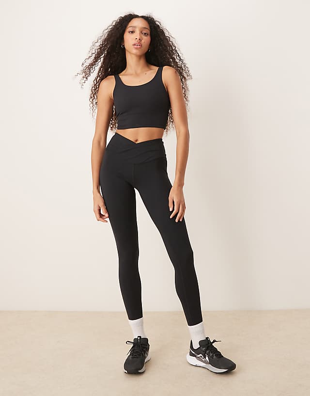 Asos Nike Training Zenvy Dri-FIT Ribbed Light Support Sports Bra In Black