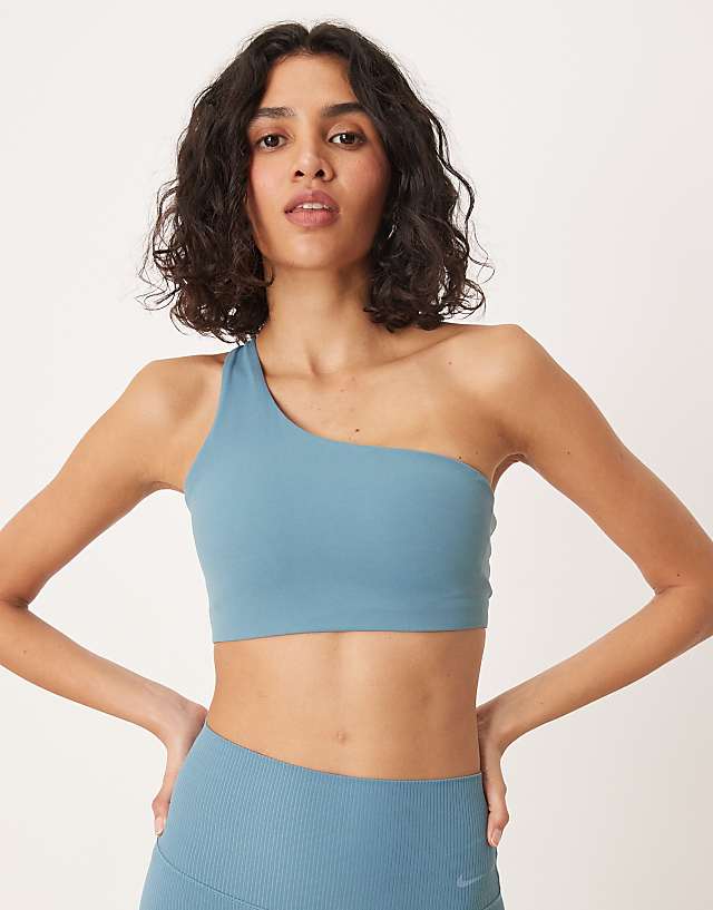 asos Nike Training Zenvy Dri-FIT soft touch asymmetric sports bra in blue