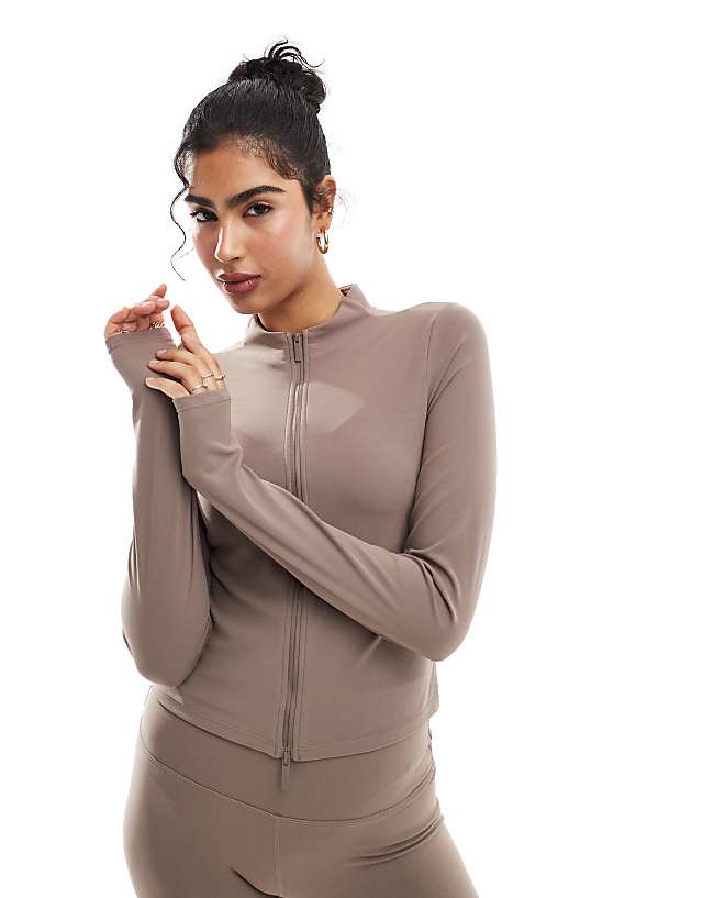asos Nike Training Zenvy Dri-FIT soft touch full zip long sleeve top in brown