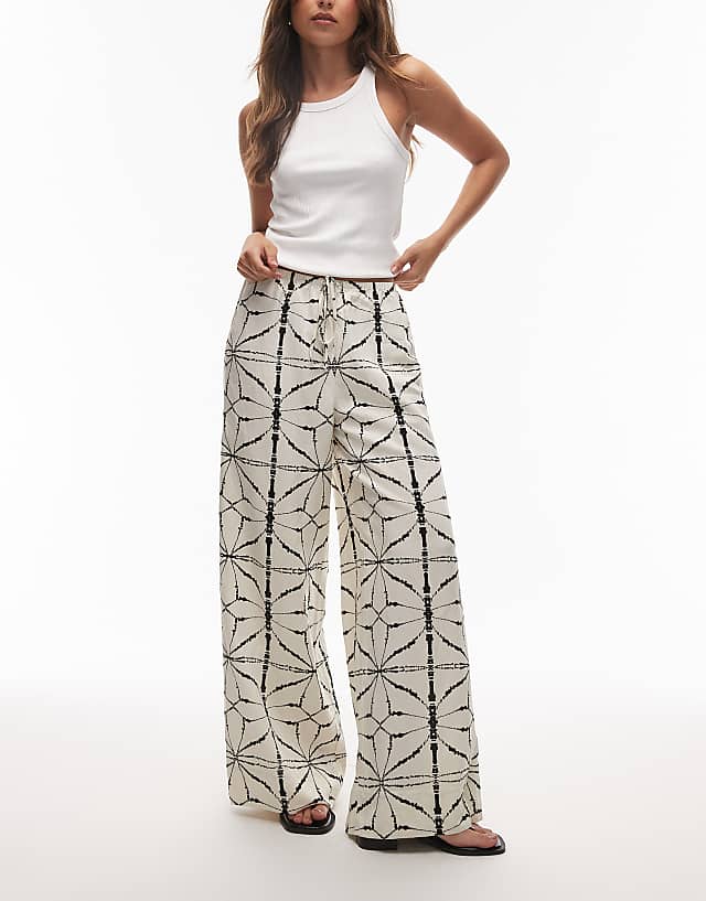 asos & Other Stories linen wide leg trousers with drawstring waist in off white and black pattern