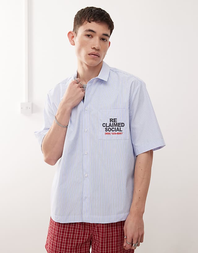 asos Reclaimed Vintage boxy short sleeve shirt with embroidery in blue pinstripe