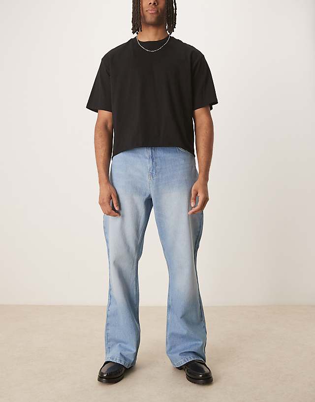 asos Reclaimed Vintage denim relaxed bootcut flare jean in light blue bleach wash